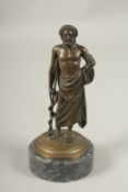 A 19TH CENTURY BRONZE STANDING FIGURE OF A ROMAN GOD on a circular marble base. 22cms high.