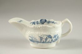 A SMALL LOWESTOFT BLUE AND WHITE SAUCEBOAT. Circa. 1771. 11cms.