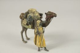 A GOOD AUSTRIAN COLD CAST PAINTED BRONZE BIRD TRAINER, three parakeets on a stand, with monkey and