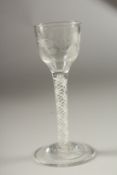 A GOOD GEORGIAN ENGRAVED CORDIAL GLASS with air twist stem.