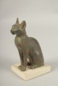 A MUSEUM COPY OF AN EGYPTIAN CAT. 15cms high.