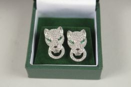 A PAIR OF SILVER PANTHER HEAD EAR STUDS.