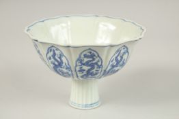A CHINESE BLUE AND WHITE DRAGON STEM CUP. 17cms diameter.