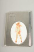 AN ENGINE TURNED SILVER CIGARETTE CASE. Birmingham 1937, with a glamour model enamel.