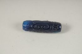 A BLUE AGATE DZI BEAD. 4cms.
