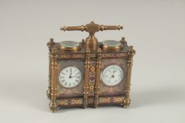 A DOUBLE CLOISONNE ENAMEL CLOCK with carrying handle. 17.5cms wide.