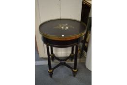 A GOOD 19TH CENTURY CIRCULAR SLATE, ORMOLU AND EBONISED CENTRE TABLE, the top inlaid with a pietra