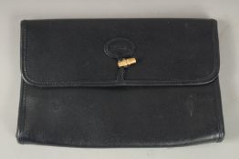 A LONGCHAMP BLUE LEATHER BAG. 25cms long x 16cms deep.