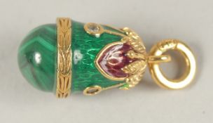A RUSSIAN SILVER AND MALACHITE EGG PENDANT.