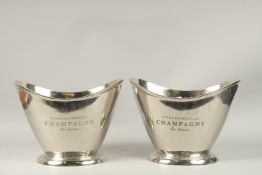 A PAIR OF OVAL CHROME WINE COOLERS 