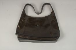 A LONGCHAMP BROWN PATTERN BAG. 36cms long x 22cms deep.