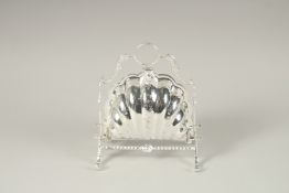 A SILVER PLATED SHELL SHAPED BISCUIT AND CHEESE STAND.