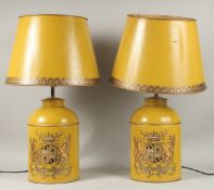 A GOOD PAIR OF CRESTED TOLEWARE LAMPS AND SHADES.