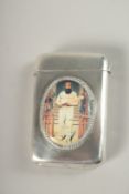 A VICTORIAN SILVER VESTA with an oval enamel of W. G. GRACE.