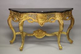 A LARGE 19TH CENTURY STYLE GILTWOOD AND MARBLE CONSOLE TABLE with matching mirror. 270cms high x