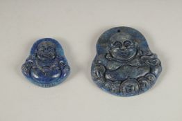 TWO CARVED LAPIS PENDANTS.
