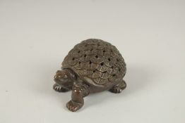 A JAPANESE BRONZE TORTOISE. 7cms.