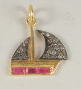 A GOLD AND ENAMEL BOAT CHARM.