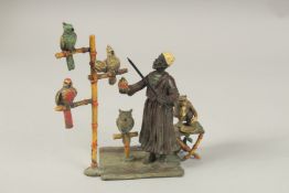 A GOOD AUSTRIAN COLD CAST PAINTED BRONZE GROUP, children playing Ring-a-Ring O 'Roses on a carpet.