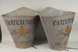A PAIR OF GREY CHATEAUNEUF-DU-PAPE GRAPE HOPPERS. 70cms high.