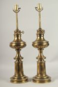 A PAIR OF BRASS STIFFEL LAMPS. 50cms high.