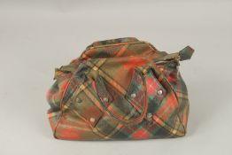 A VIVIENNE WESTWOOD CHECKERED LEATHER BAG. 26cms long x 18cms deep.