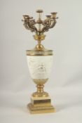 A 19TH CENTURY PARIAN LAMP with four scrolling branches on a square base. 66cms high.