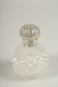 A VICTORIAN CUT GLASS SCENT BOTTLE with silver top. 10cms high. Chester 1894.