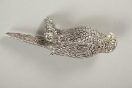 A RUBY COLLAR NOVELTY PARROT PERFUME BOTTLE. 9cms.