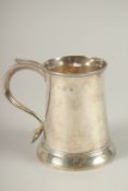 A GEORGE III SILVER PINT TANKARD with scroll handle. London 1779. Maker: W. G. Weight: 11ozs.