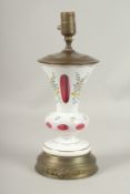A BOHEMIAN RUBY AND ENAMEL GLASS LAMP. 38cms high.