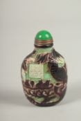 A PEKING GLASS SNUFF BOTTLE.