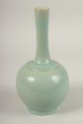 A CHINESE CELADON TWIN-HANDLE CRACKLE GLAZE VASE. 28cms high.