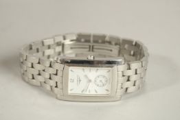 A LONGINES CHROME WRISTWATCH with papers and white box. Purchased '99.
