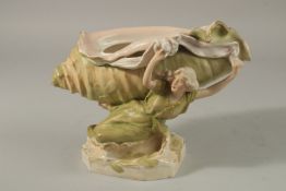 A ROYAL DUX PORCELAIN SHAPED BOWL held by a young lady. 17cms high. Triangle mark No. 1117.