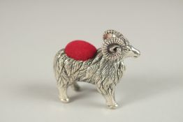 A NOVELTY SILVER RAM PIN CUSHION. 4cms.