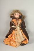 ARMAND MARSEILLE, 390 A10M, A LARGE BISQUE HEADED DOLL, with open and shut eyes, open mouth,