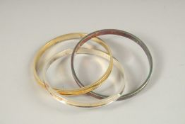 THREE REPLICA ENTWINED SILVER BANGLES. Etched TIFFANY.