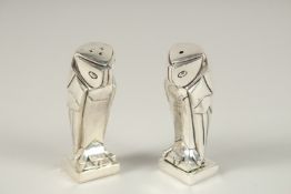 A PAIR OF DECO OWL SALT AND PEPPERS.