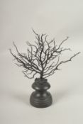 A BLACK CORAL SPECIMEN. 17cms, on a turned wood stand.