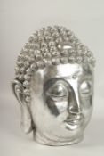 A LARGE SILVERED BUDDHA HEAD.