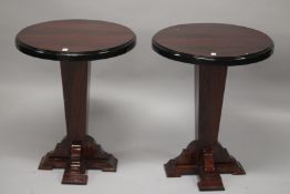A PAIR OF ART DECO STYLE ROSEWOOD CIRCULAR PEDESTAL TABLES. 73cms high x 59cms diameter.