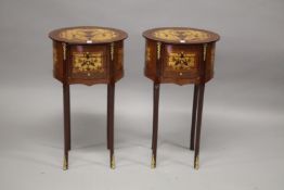 A PAIR OF FRENCH STYLE MAHOGANY AND MARQUETRY OVAL SHAPED THREE DRAWER BEDSIDE CHESTS. 71cms high