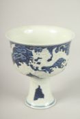 A CHINESE BLUE AND WHITE DRAGON STEM CUP. 17cms high.