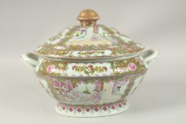 A LARGE CANTON DESIGN PORCELAIN OVAL TWO-HANDLED TUREEN AND COVER, decorated with flowers and