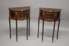 A PAIR OF FRENCH STYLE MAHOGANY AND MARQUETRY DEMI-LUNE THREE-DRAWER BEDSIDE CHESTS. 67cms high x