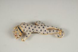 A SUPERB YELLOW GOLD DIAMOND AND SAPPHIRE PANTHER BROOCH, POSSIBLY CARTIER, the body set with