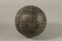 AN ENGRAVED BRASS GLOBE.