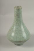 A CHINESE CELADON CRACKLE GLAZE PORCELAIN VASE, in original wooden box, vase 24cm high.