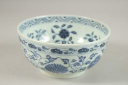 A CHINESE BLUE AND WHITE PORCELAIN LOTUS BOWL, base with six-character mark, 18cm diameter.